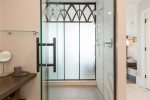 Spacious walk-in glass shower, stocked with the amazing Beekman shampoo, conditioner, and body wash 